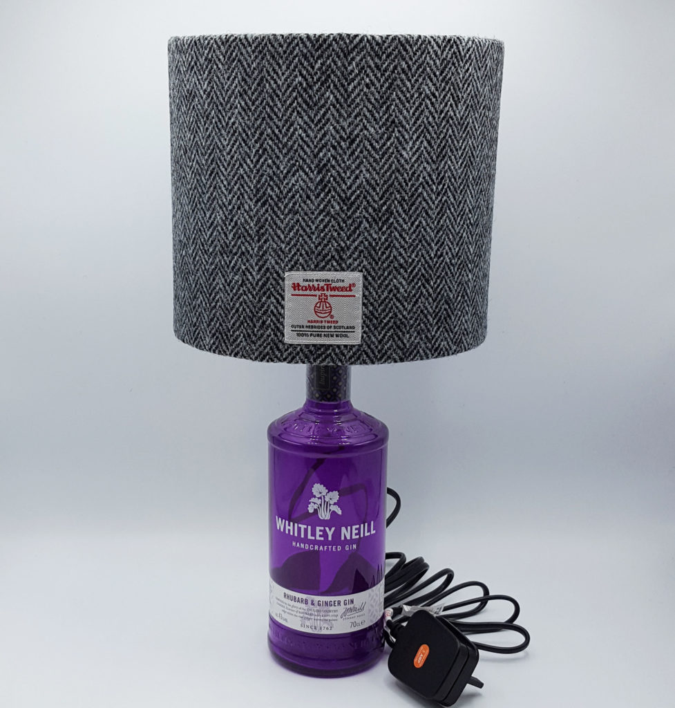 Whitley Neill bottle lamp with 20cm D black & white herringbone Harris Tweed lampshade