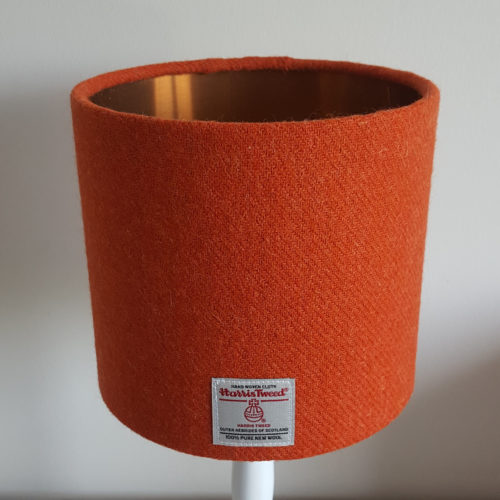 muted orange lampshade with copper lining