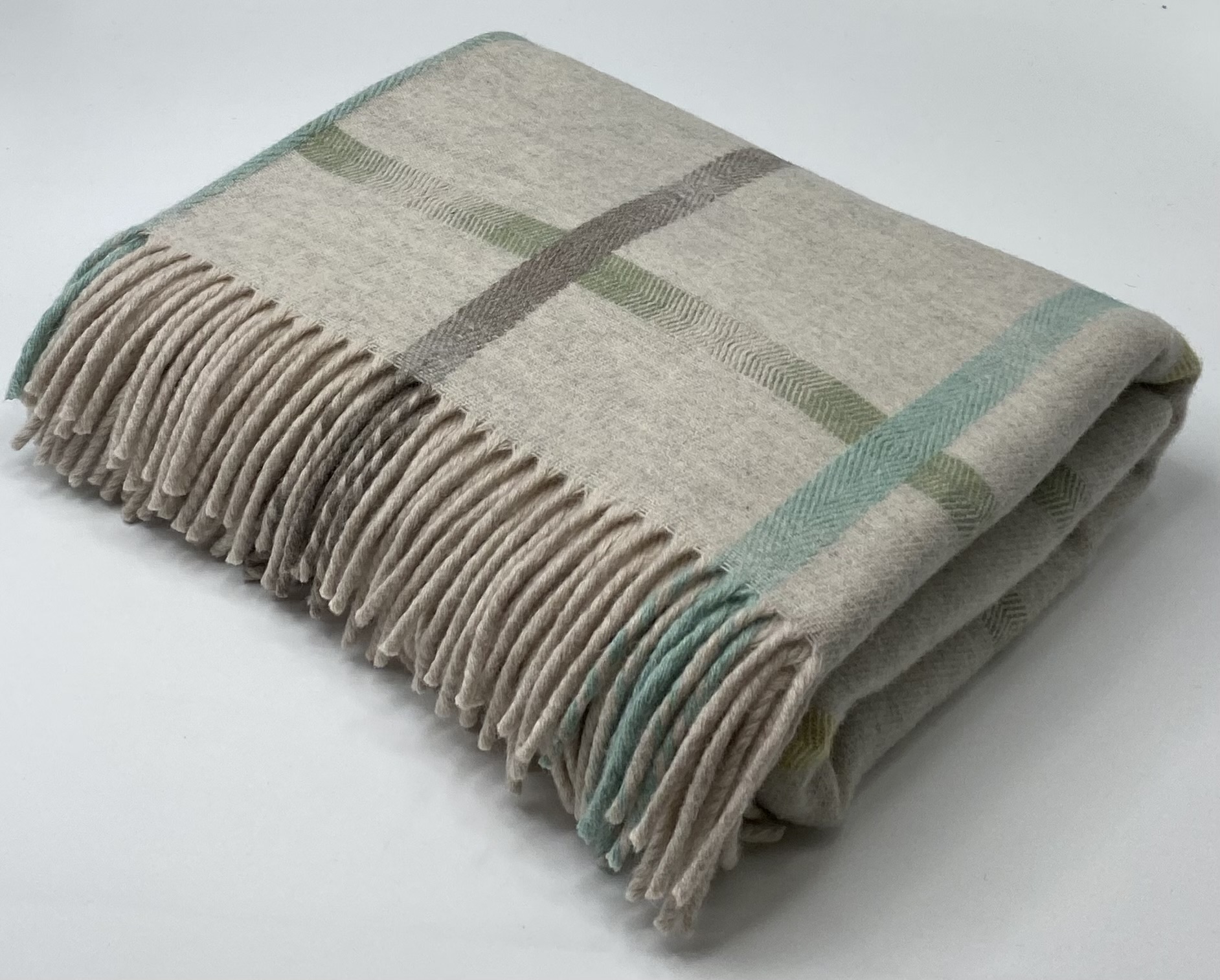 Maree Throw Blanket in Feather by The Isle Mill